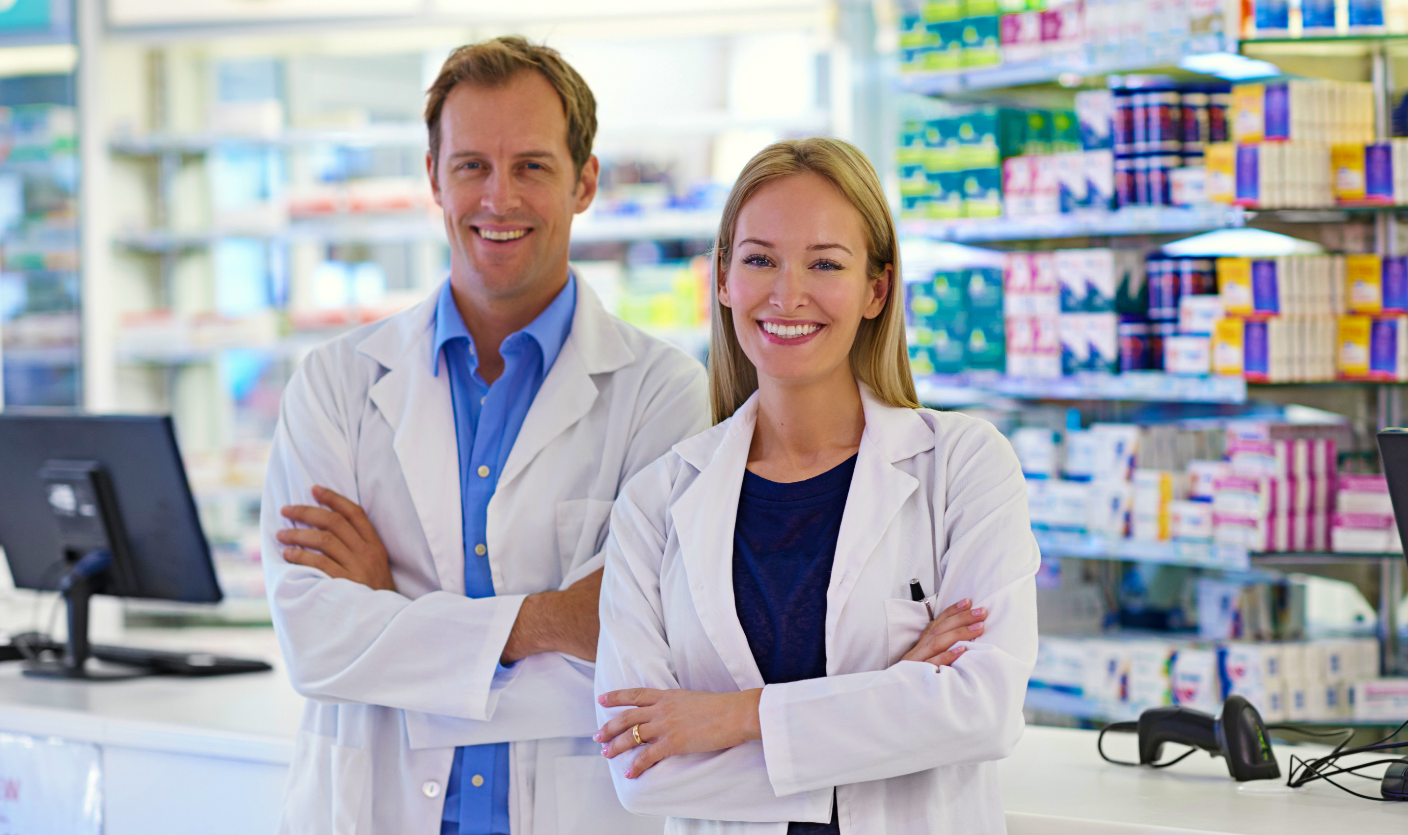 Two pharmacists working in a drugstore.